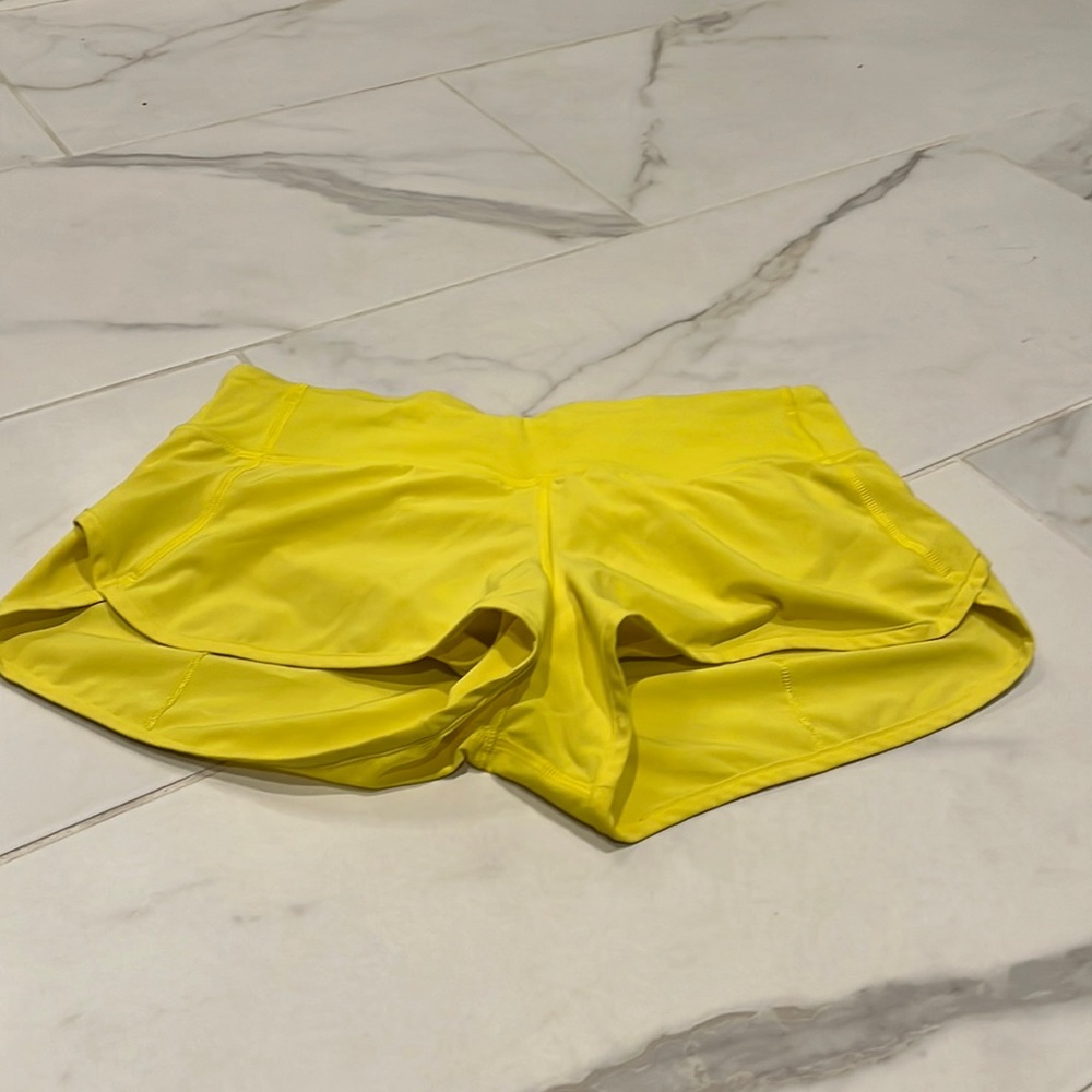 Lululemon lemon yellow size 4 running shorts.